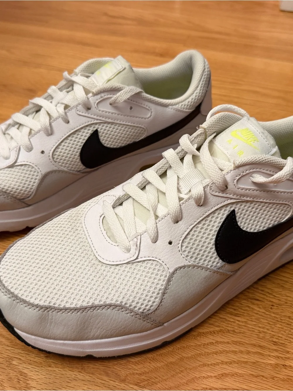 Nike Men's White Sneakers with Black Swoosh and Neon Yellow Accents
